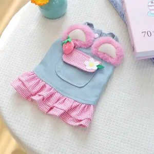 Denim pet dress for small dogs with strawberry plush details and pink plaid ruffles