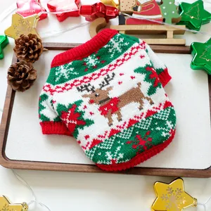 Detailed knit pattern of a Christmas pet sweater featuring reindeer and snowflake motifs