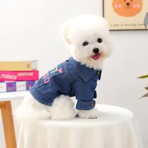 Cozy blue denim dog jacket with heart embroidery for small pets on a white dog