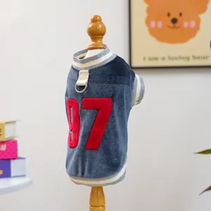 Detail of navy velvet pet jersey with number 97 embroidery and metal D-ring for leash