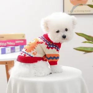 Orange monster knit sweater for small dogs featuring colorful patterns and ribbed edges
