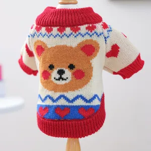 Detailed close-up of knit texture and cute cartoon bear pattern on the pet sweater
