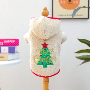 Detail of soft sherpa pet hoodie with My First Christmas embroidery and festive tree