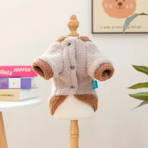 Detail of oatmeal sherpa pet hoodie with brown contrast trim and button closure