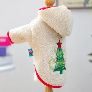 Detail of fleece pet hoodie with Christmas tree embroidery and metal D-ring for leash