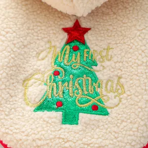 Macro detail of 'My First Christmas' embroidery on soft sherpa fleece pet hoodie