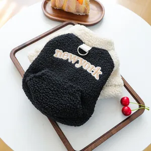 Detail of New York embroidery and metal D-ring on fleece warm dog vest jacket