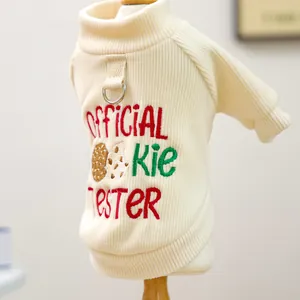 Detail of dog sweater with D-ring and Official Cookie Tester embroidery on ribbed fabric