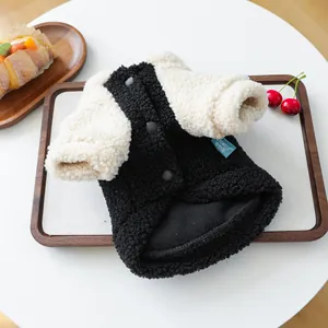 Macro detail of plush sherpa fleece pet hoodie with stylish buttons and textured fabric