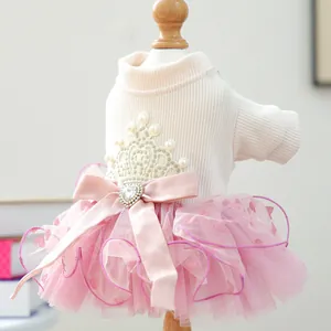 Close-up of pet princess dress with crown embroidery and heart printed pink tulle skirt