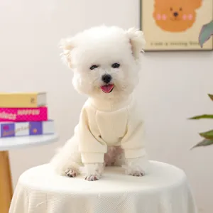 Close-up of cream ribbed pet knit sweater with embroidery for small dogs