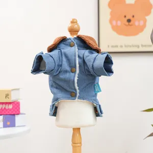 Close-up of pet denim coat with corduroy collar and warm faux sheepskin lining details