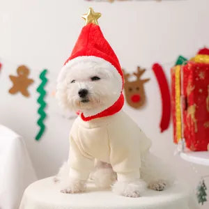 Festive pet Christmas set with knit sweater and plush hat with star detail