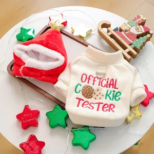 Detail of Christmas pet sweater with cookie tester embroidery and matching Santa hat
