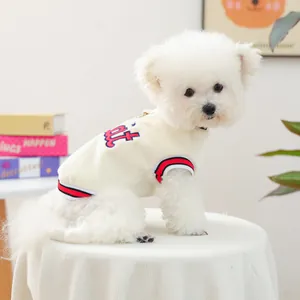 Knitted dog sweater in cream with athletic stripe trim and sweet letter embroidery