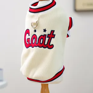 Detail of cream knit pet vest with Goat embroidery and D-ring for leash attachment