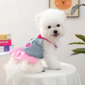 Pink and blue denim pet dress for small dogs with floral embroidery and ruffle trim