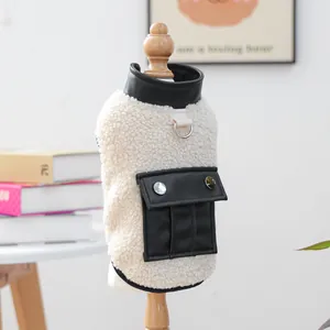 Detail of warm lamb wool pet vest with leather patchwork and back pocket feature