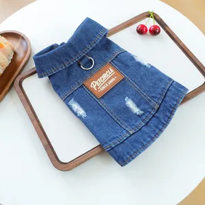 Distressed blue denim pet vest for dogs and cats with metal D-ring and leather tag