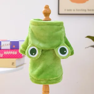 Detail of green frog-themed flannel pet hoodie featuring plush 3D eyes and soft texture