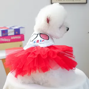Close-up of pet dress showing white cotton vest with American flag embroidery and red tutu