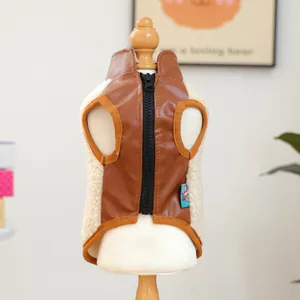 Detail of warm brown pet vest with faux leather, fleece lining and back zipper closure