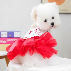 Detailed view of dog Valentine dress with red heart prints and layered mesh tutu