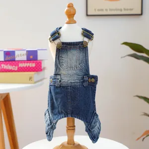 Blue denim pet overalls for small dogs and cats with adjustable straps and metal buckles
