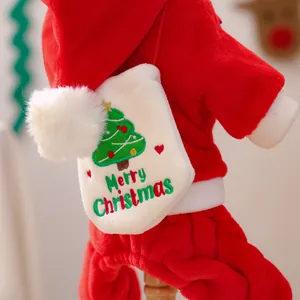 Detail of red plush dog outfit with Merry Christmas tree embroidery and white pocket