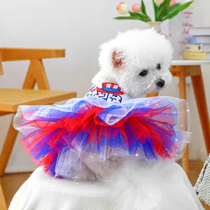 Detailed embroidery and silver stars on a blue and red pet tutu dress for small dogs