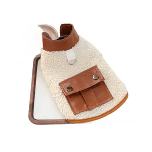 Sherpa fleece dog vest with brown leather pocket and D-ring for leash attachment