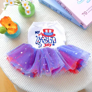 Detail of pet dress showing 4th of July embroidery and colorful sequined tulle skirt
