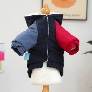 Detail of color-block pet hoodie with warm fleece lining and snap buttons