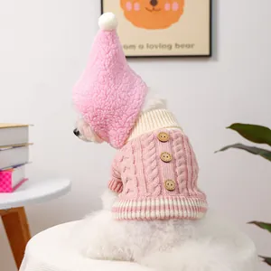 Pink cable knit dog sweater and warm hat set with decorative wooden buttons for pets