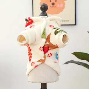 Detail of warm beige pet hoodie with cute cartoon reindeer and floral prints