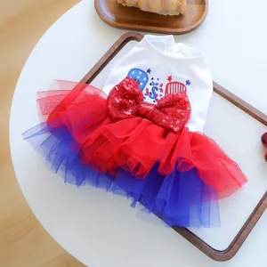 Detailed view of USA flag embroidery and sequin bow on a pet tulle princess dress