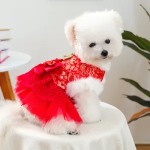 Festive red pet dress with gold flower embroidery and lace hem for small dogs