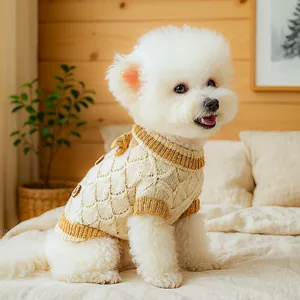 Detailed knit texture and wooden button of this hollow-out pet sweater for small dogs