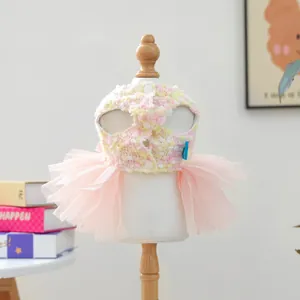 Cute pink tweed pet puppy tutu dress featuring multi-layer mesh skirt and back snap buttons.