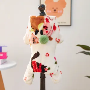 Mono de felpa beige para mascotas con estampados de gatos y pompón verde en la capucha