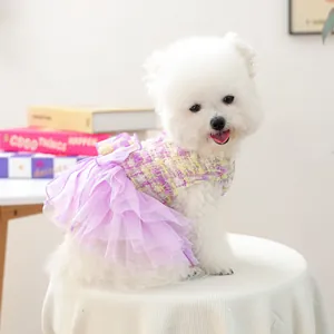 Cute pet detail shot showcasing the multi-layer purple mesh tutu skirt designed for small dogs.