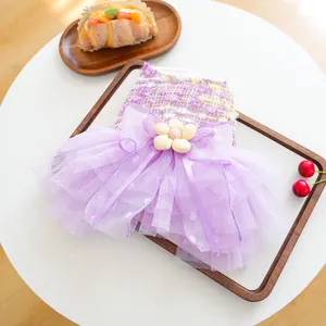 Purple pet mesh tutu dress with bow and flower, cute puppy costume for small dogs detail view.