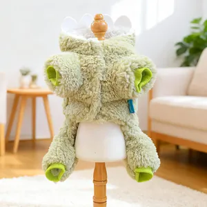 Maglione in peluche verde chiaro per animali con punte di dinosauro e polsini a coste