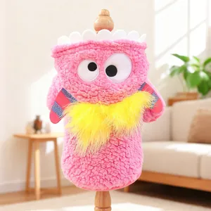 Maglione rosa in velluto per cani con occhi di mostro e decoro in peluche giallo