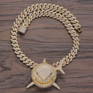 Gold-plated hip hop shark pendant necklace with cubic zirconia on a Cuban link chain