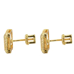 Detail view of gold square stud earrings with micro-pave stones and secure screw-back posts
