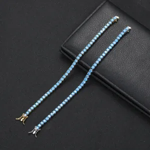 Gold and silver hip hop tennis bracelets set with sea blue cubic zirconia stones