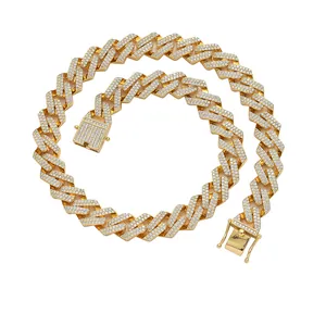 Macro shot of 13mm gold diamond-encrusted rhombic Cuban link chain with a secure box clasp