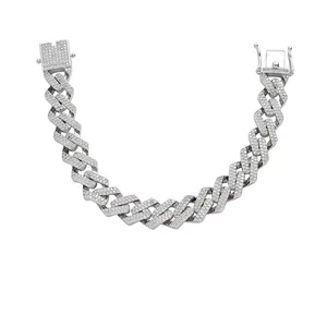 Detail of 13mm silver Cuban link bracelet featuring micro-paved cubic zirconia stones