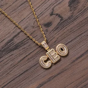 Golden hip hop CEO pendant necklace with iced out cubic zirconia and rope chain